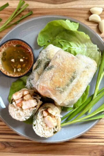 Lemongrass shrimp in crispy rice paper on top of a butter lettuce leaf