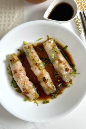 shrimp rice paper rolls on a white plate