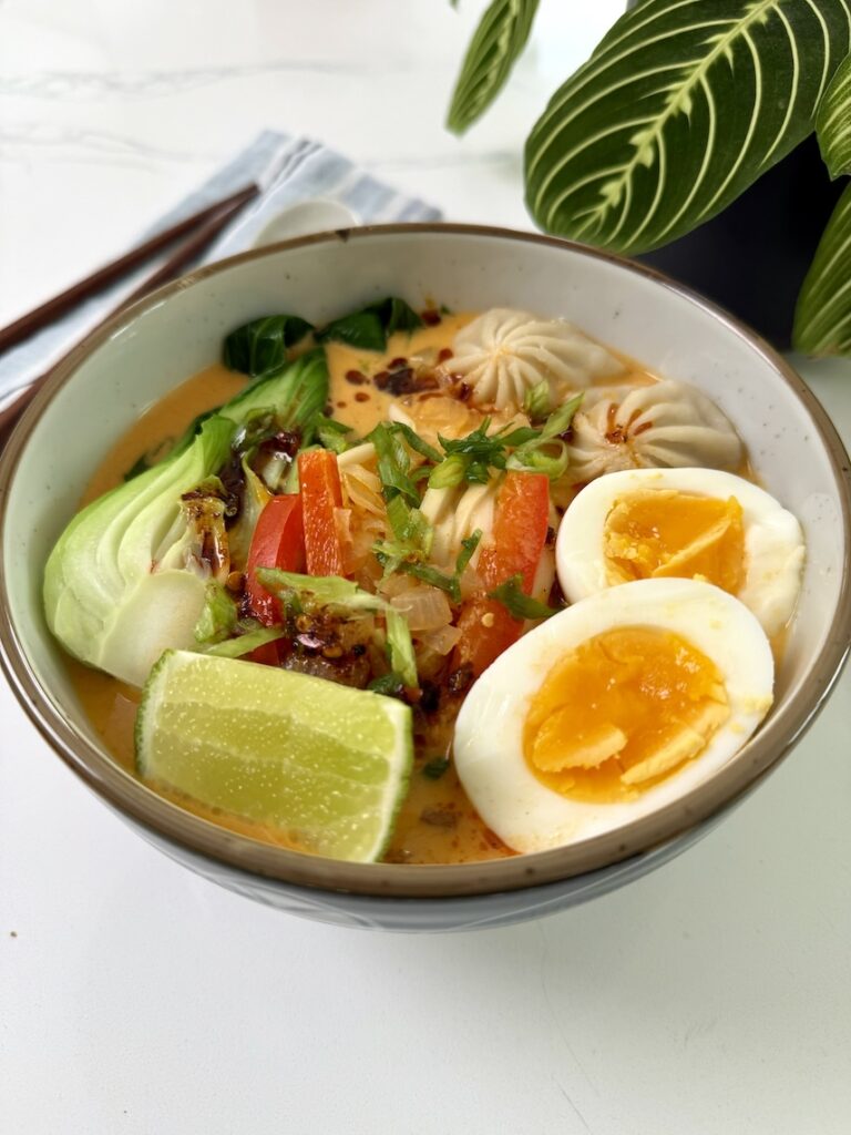 Thai coconut curry noodle soup in a bowl