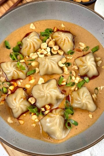 Soup Dumplings with Spicy Peanut Sauce - Featured