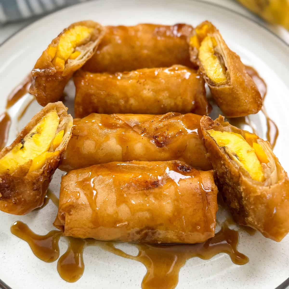 Banana Lumpia (Turon) on a plate featured view