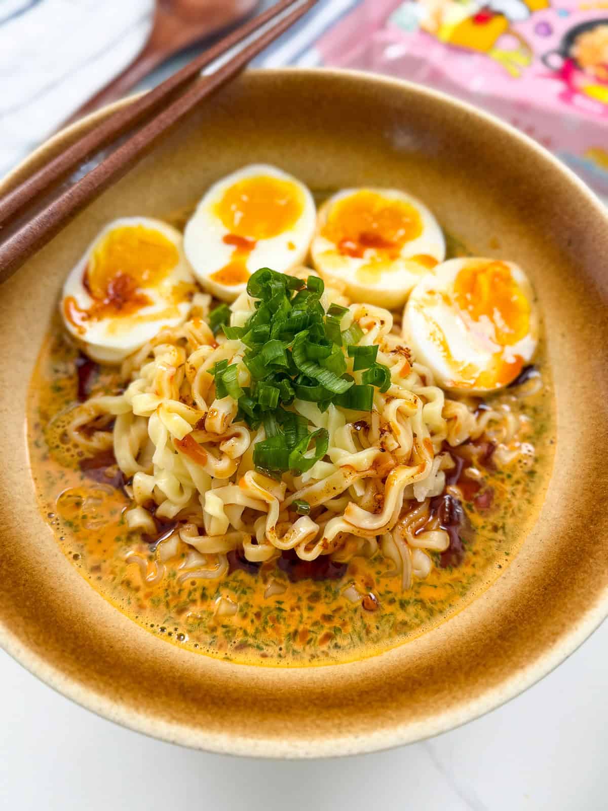 Buldak Peanut Butter Ramen in a bowl side view