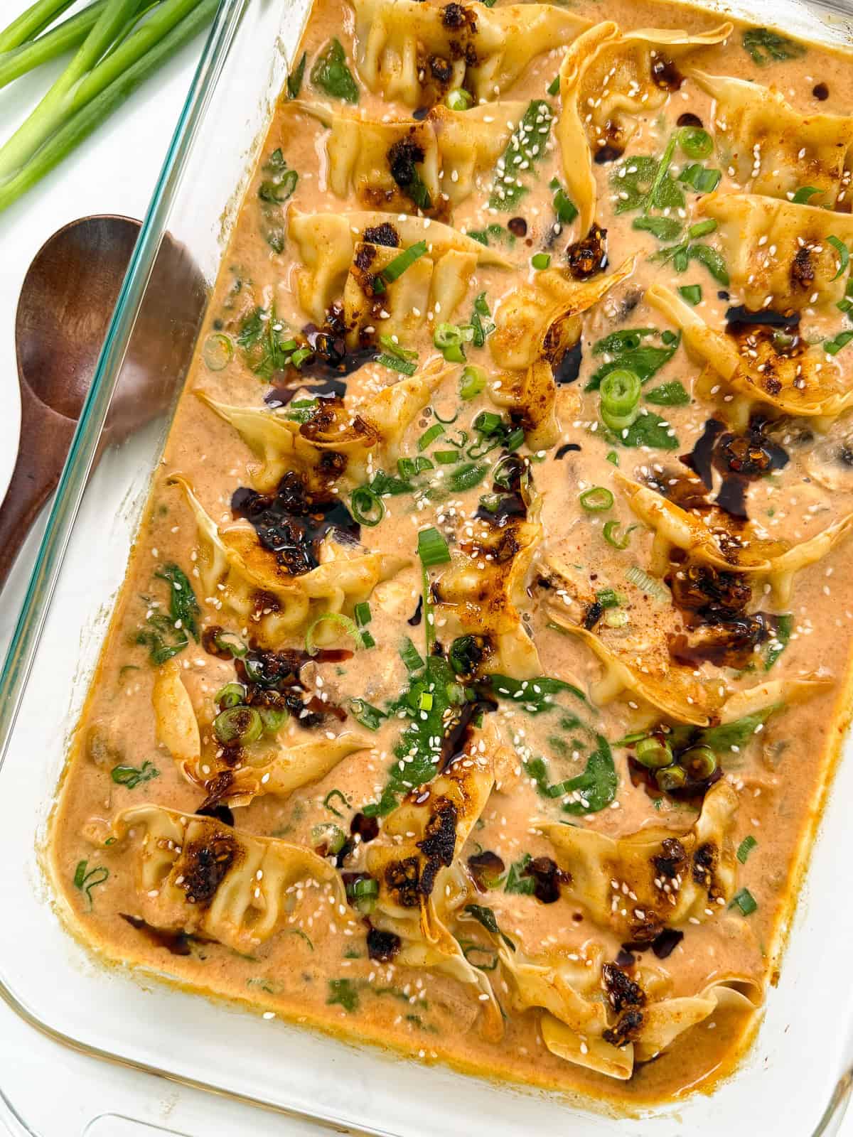 Dumpling Bake (Viral One Pan Recipe) in a baking dish with sauce zoomed out view