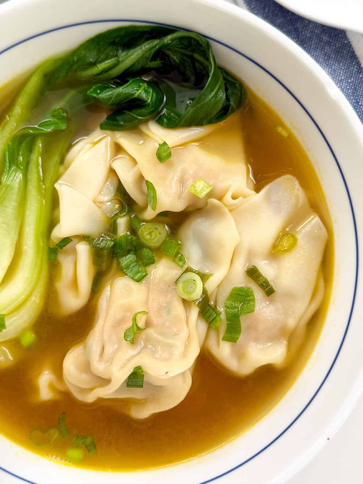Easy Wonton Soup Recipe in a bowl top down view