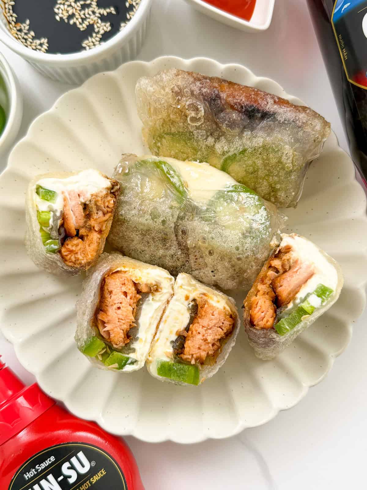 Jalapeno Salmon Cream Cheese Rice Paper Dumplings on a plate top view