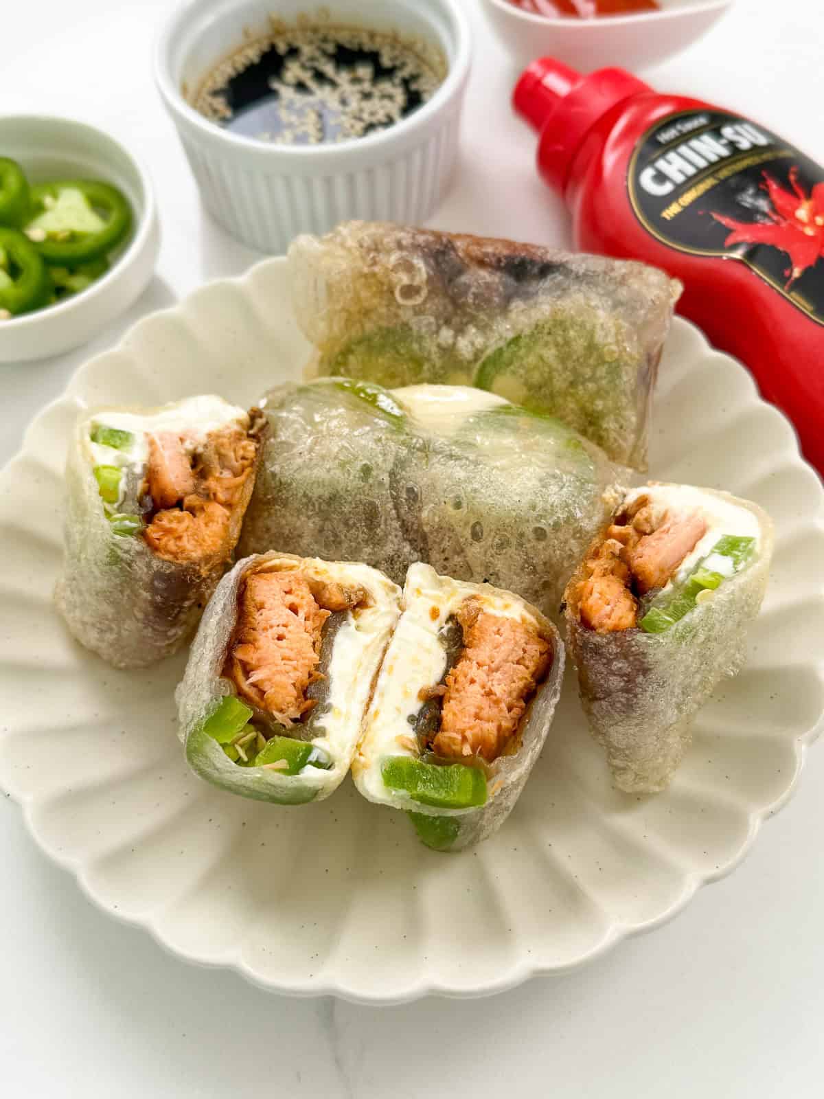 Jalapeno Salmon Cream Cheese Rice Paper Dumplings on a plate side view