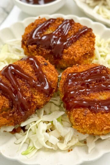 Japanese Sweet Potato Croquettes (Satsumaimo Korokke) three on a plate side view