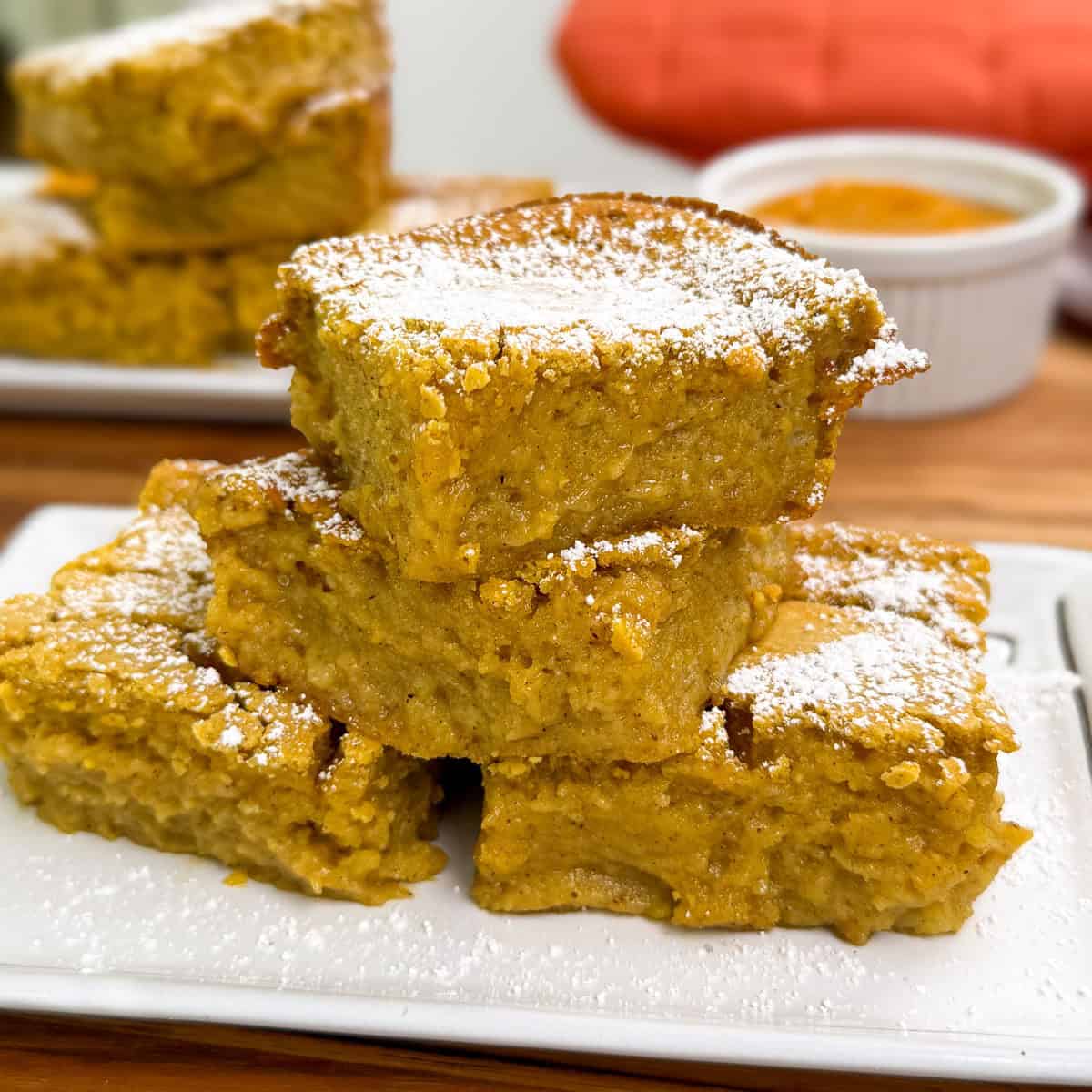 Pumpkin Butter Mochi on a plate stacked featured view