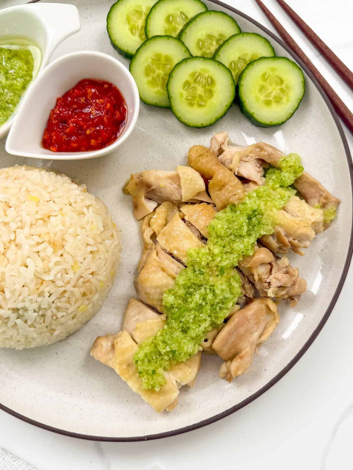Rice Cooker Hainanese Chicken Rice with ginger scallion sauce top view
