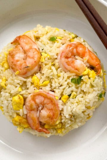 Shrimp Fried Rice on a plate with chopsticks featured view