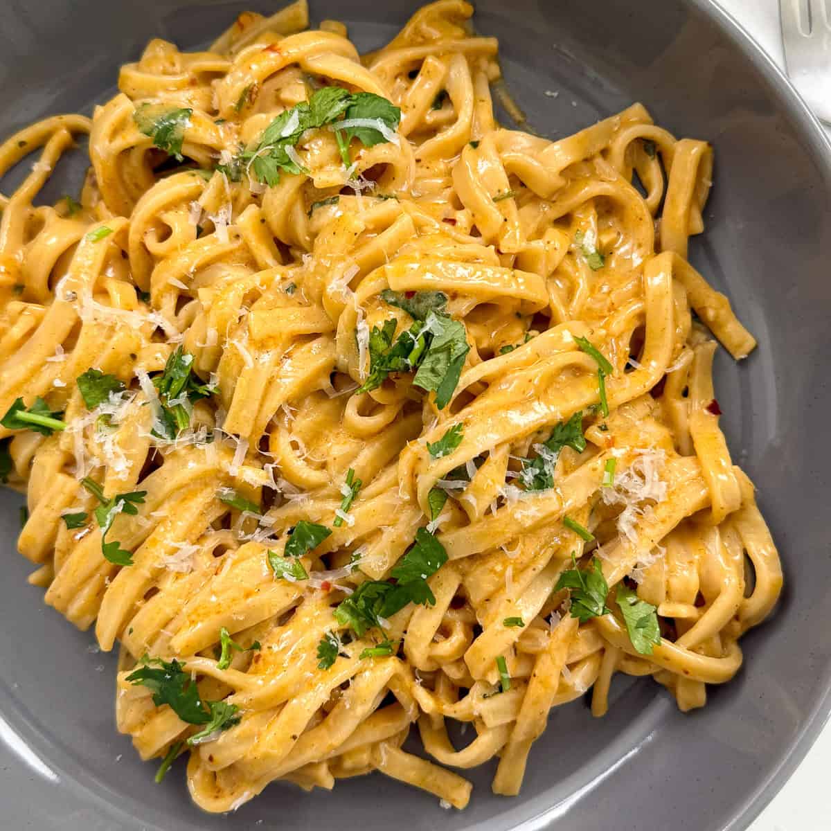 Garlic butter noodles in a bowl main view