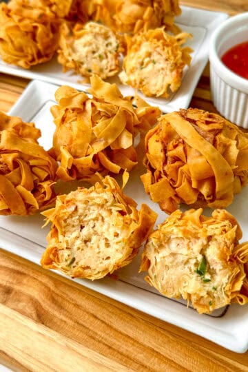 Fried shrimp balls on a plate featured view