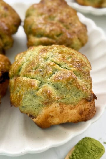Matcha pineapple bun (bolo bao) zoomed in one roll featured view