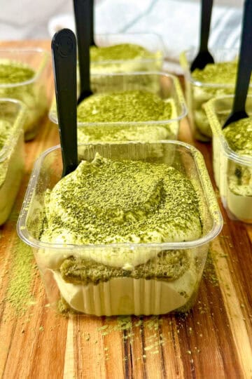 Matcha tiramisu in individual cups with spoons featured view