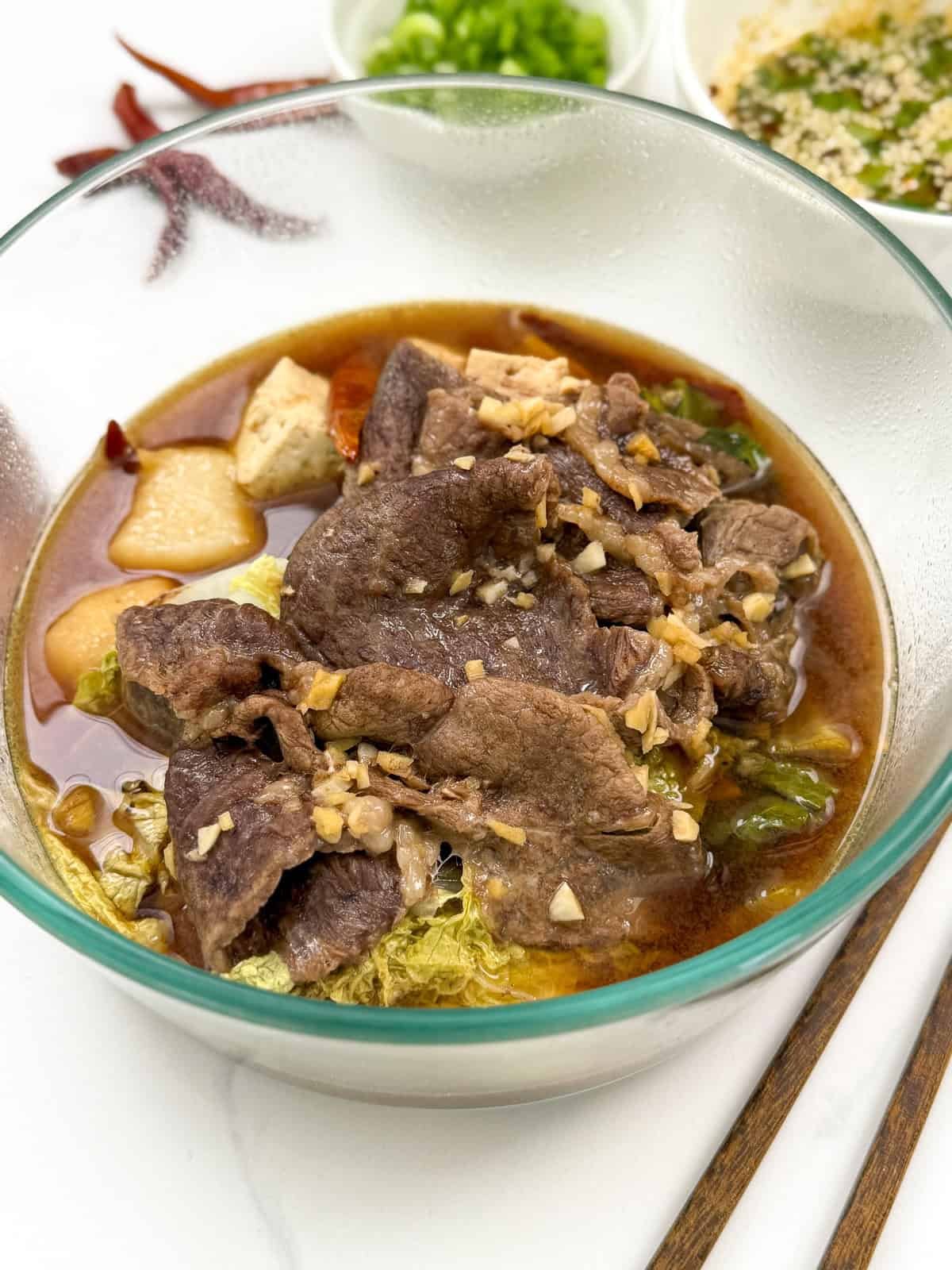 Microwave hotpot in a glass bowl side view