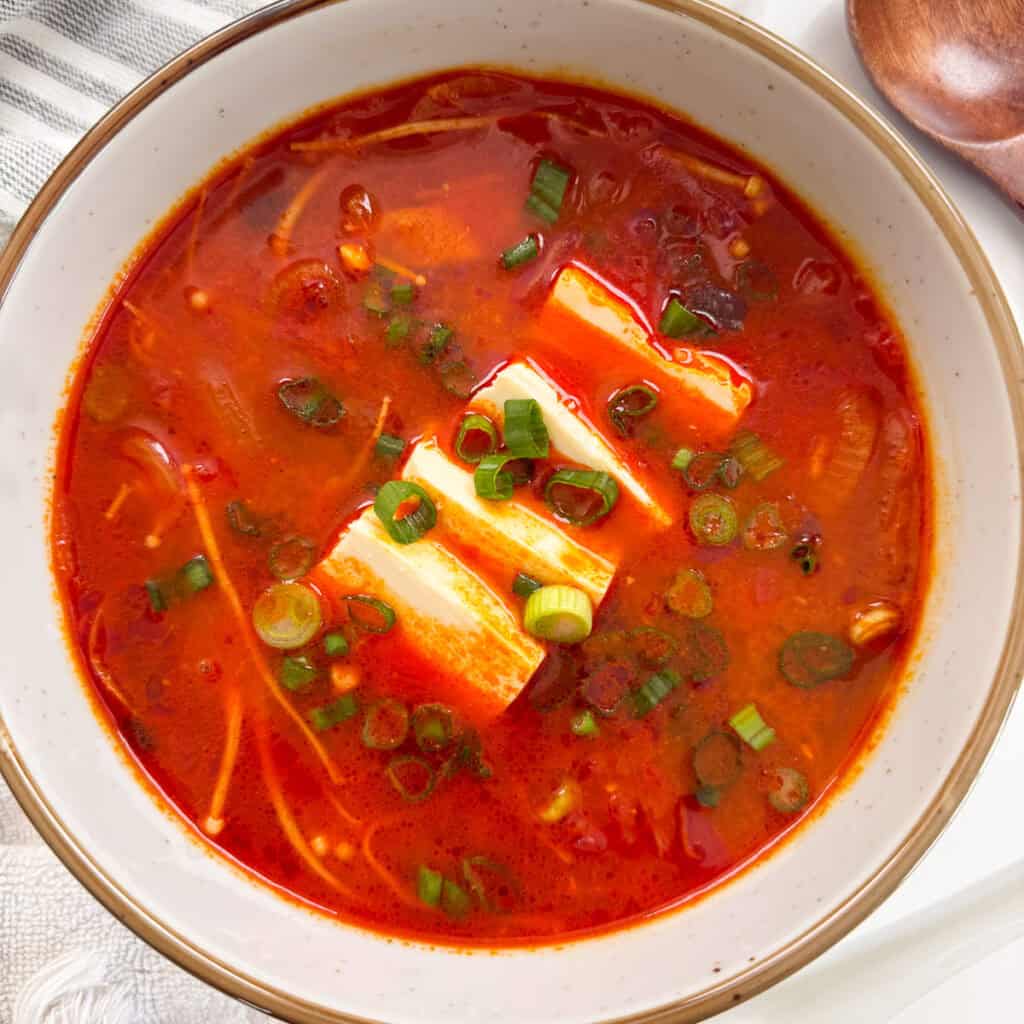 Kimchi Jjigae (Kimchi Stew) in a bowl featured view