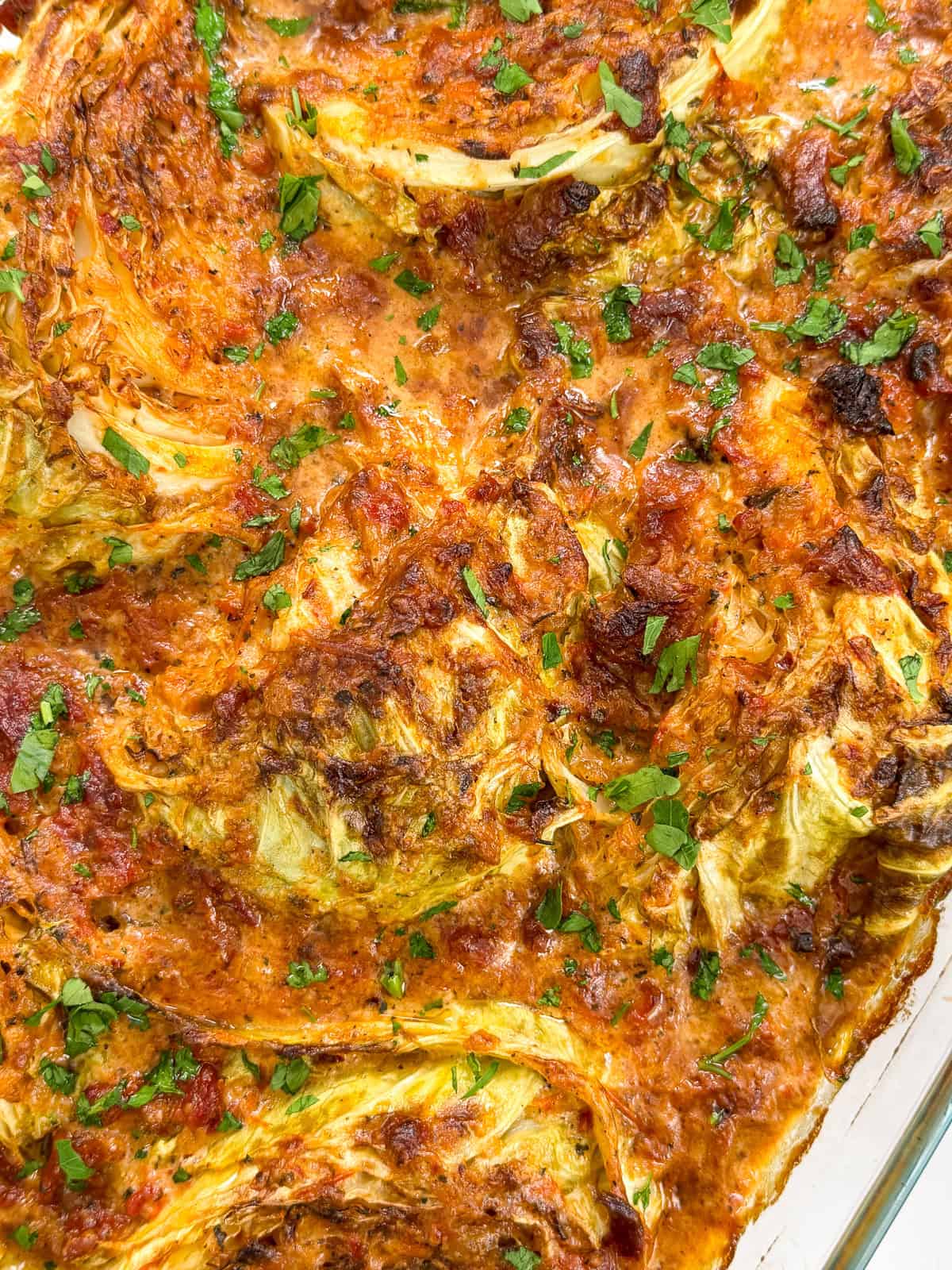 Marry Me Melting Cabbage zoomed in view with chopped parsley on top